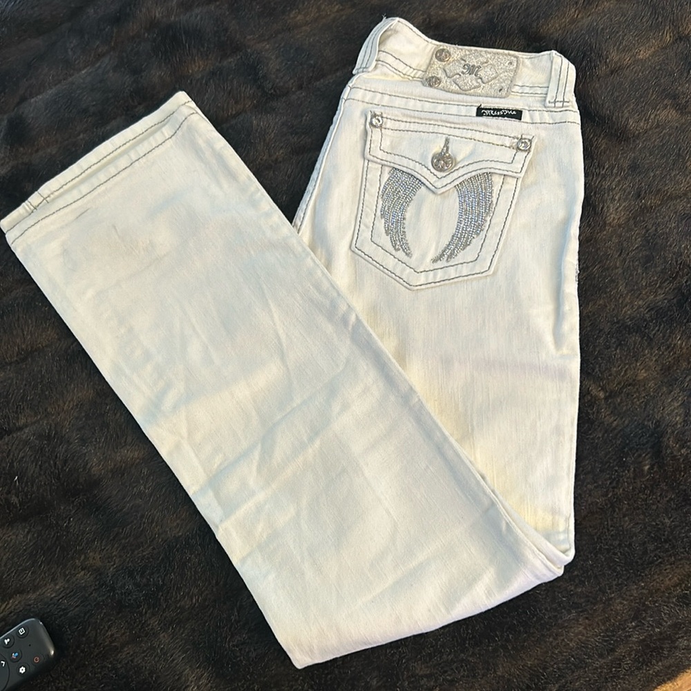 Miss me white with silver sequin angel wing jeans.